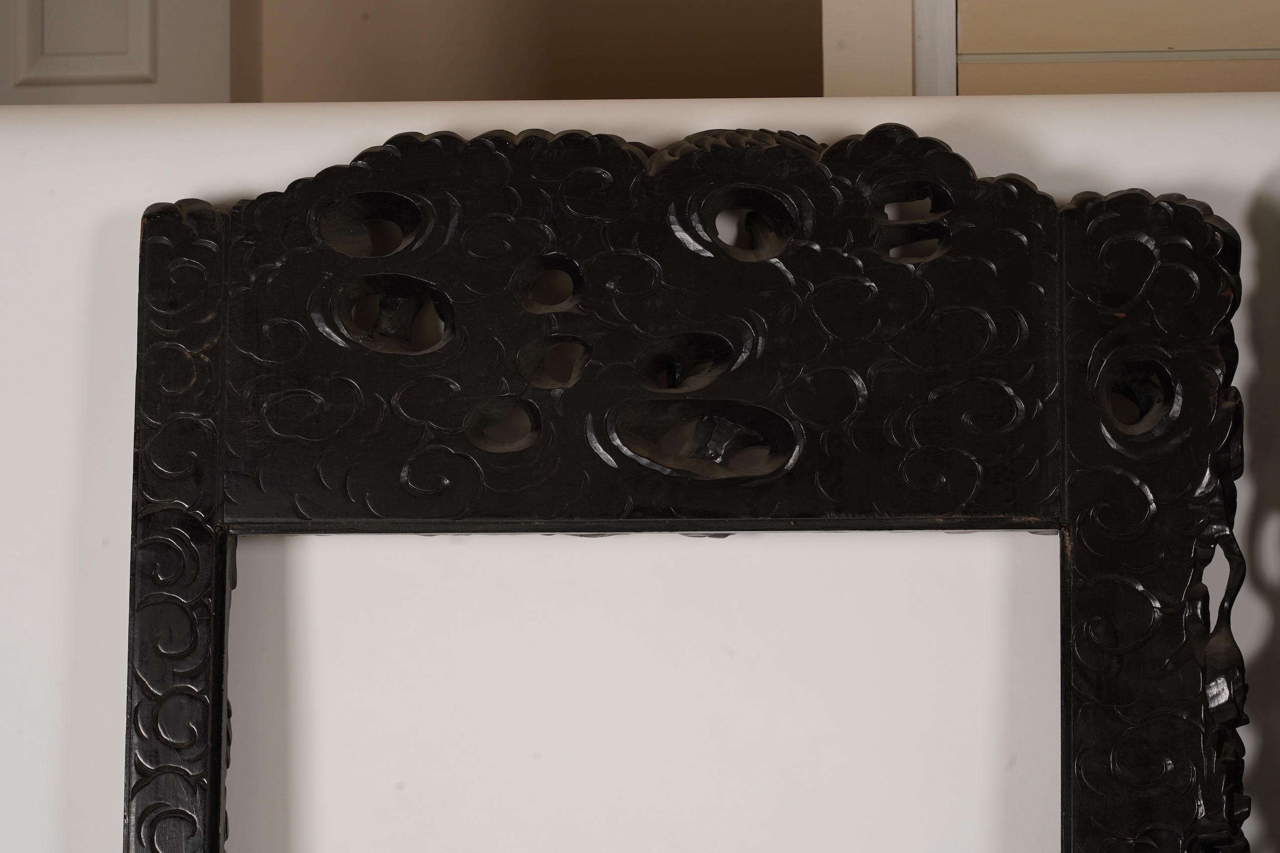A pair of large Japanese carved hardwood ’dragon’ screen frames, Meiji period